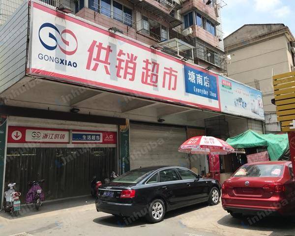 供销超市塘南店 - 大门口摇摇车旁边